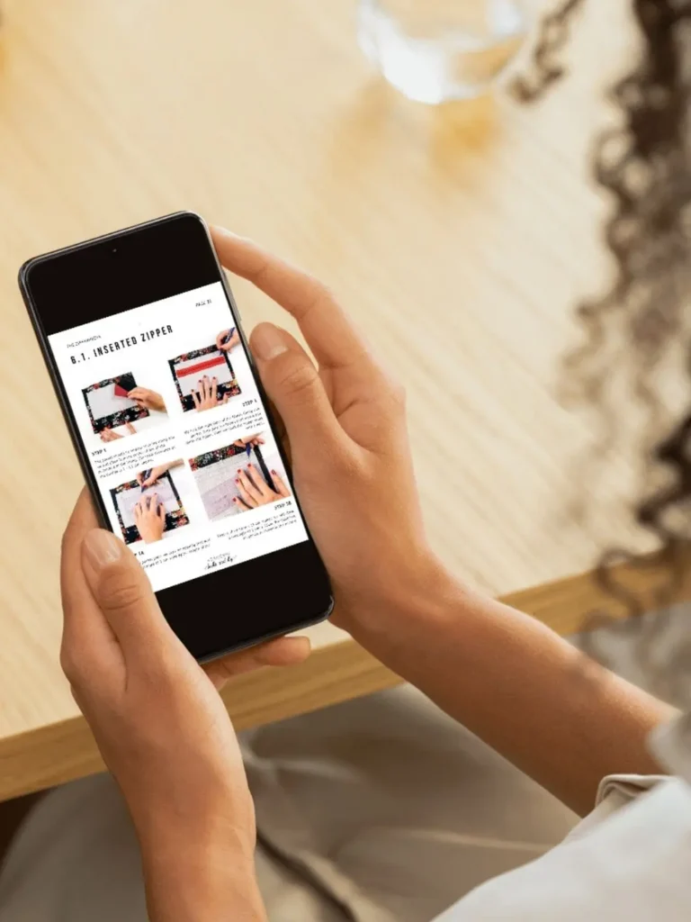 A student follows the guide to install a zipper, a key skill when teaching yourself how to sew.